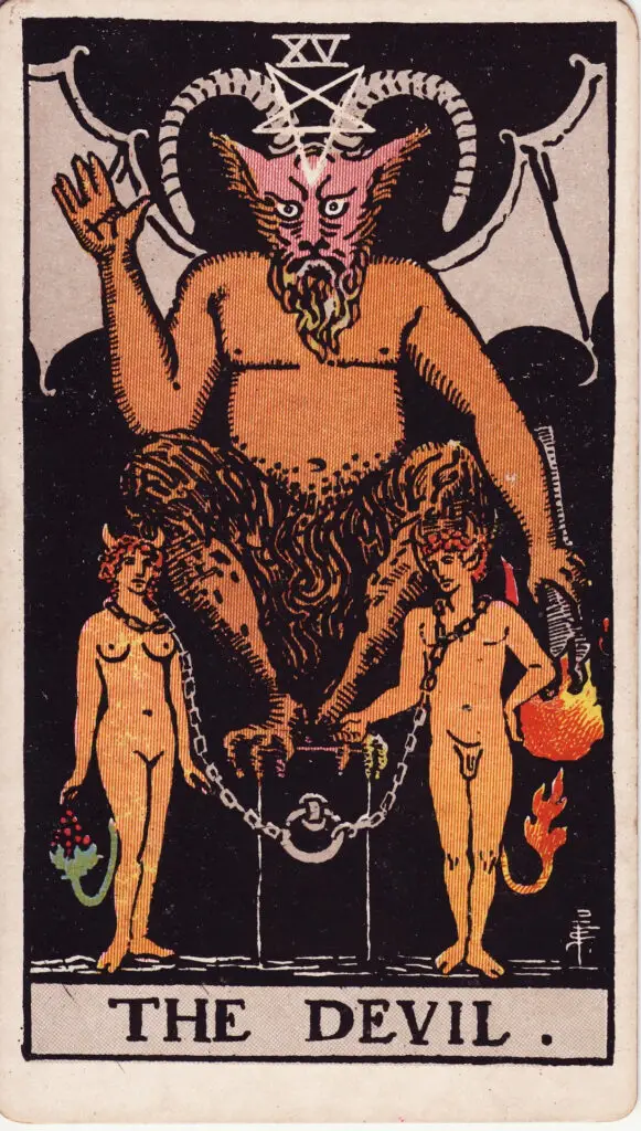 Carte du Diable dans le tarot Rider-Waite : une figure ailée et cornue trône sur un piédestal, deux personnages enchaînés à ses pieds. Illustration de 1909 par Pamela Colman Smith.